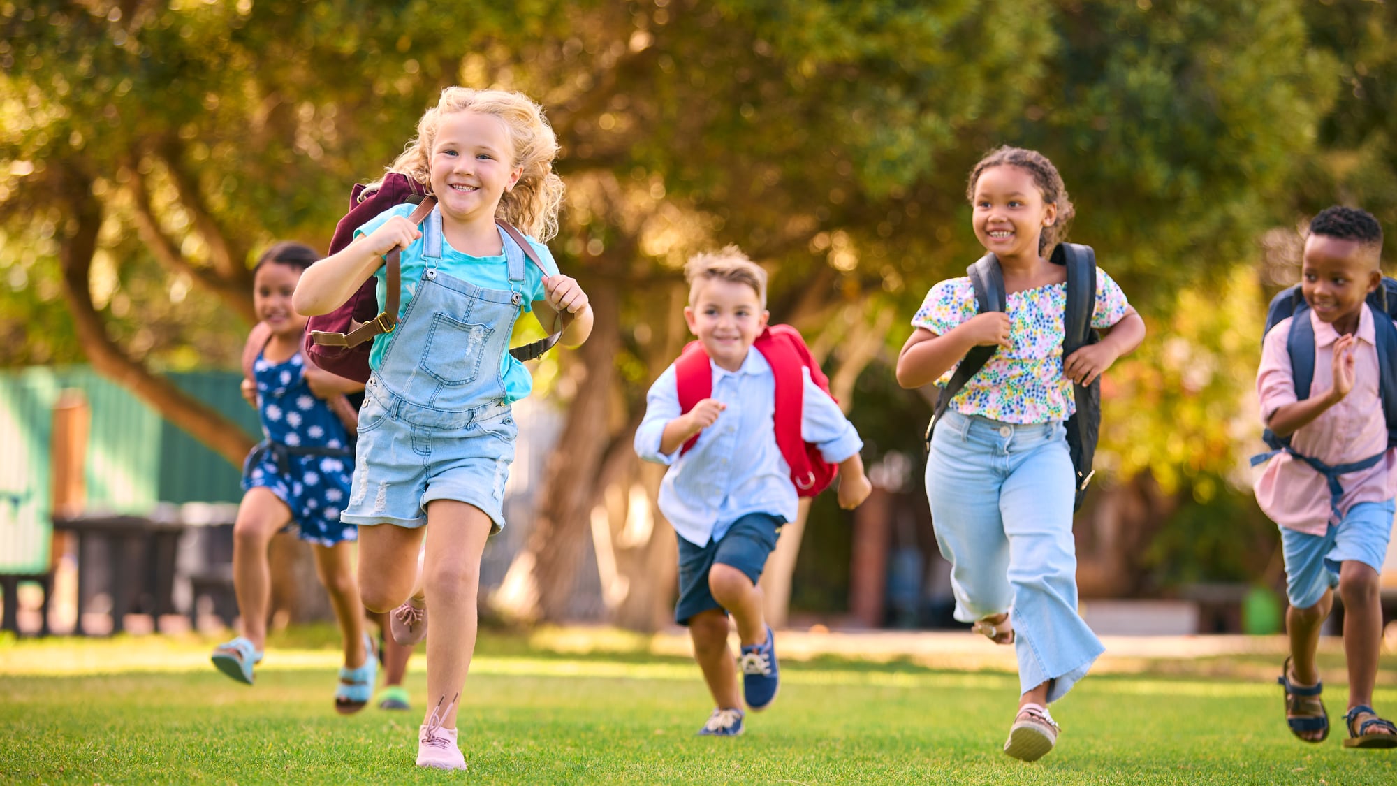 Elementary students arriving at school